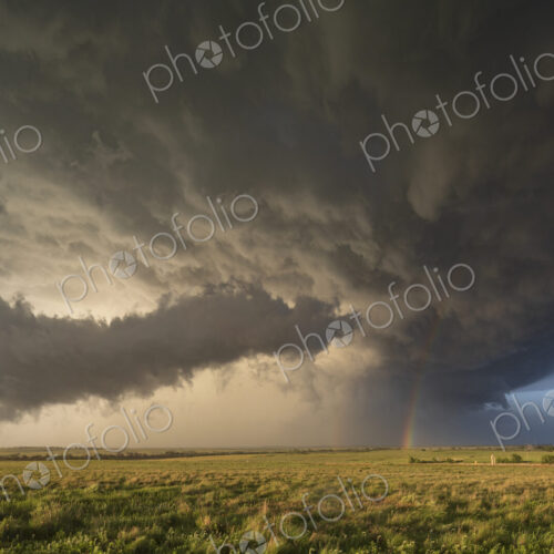 Back Side of a Tornado-Producing Supercell, black clouds, and blue sky on the horizon… Back Side of a Tornado-Producing Supercell, black clouds, and blue sky on the horizon…