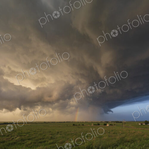Back Side of a Tornado-Producing Supercell, blue sky on the horizon. Back Side of a Tornado-Producing Supercell, blue sky on the horizon.