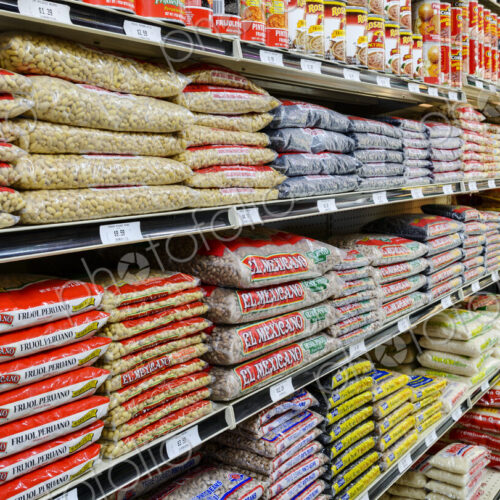 Bags of food on shelves of grocery store