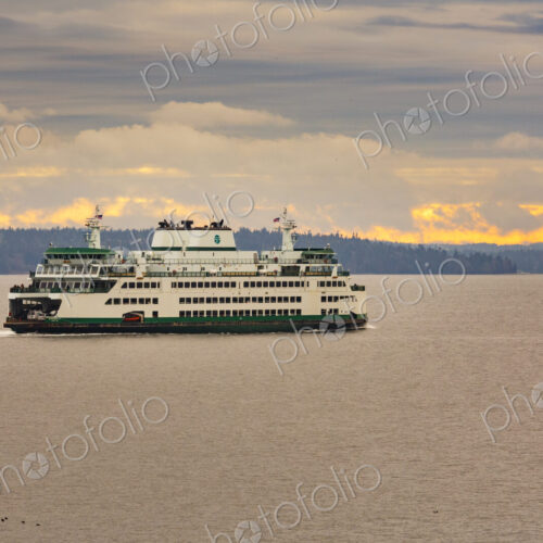 Bainbridge Island to Seattle ferry on Elliott Bay with Mount Rainier in the distant…