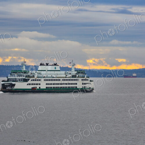 Bainbridge Island to Seattle ferry on Elliott Bay with Mount Rainier in the distant…