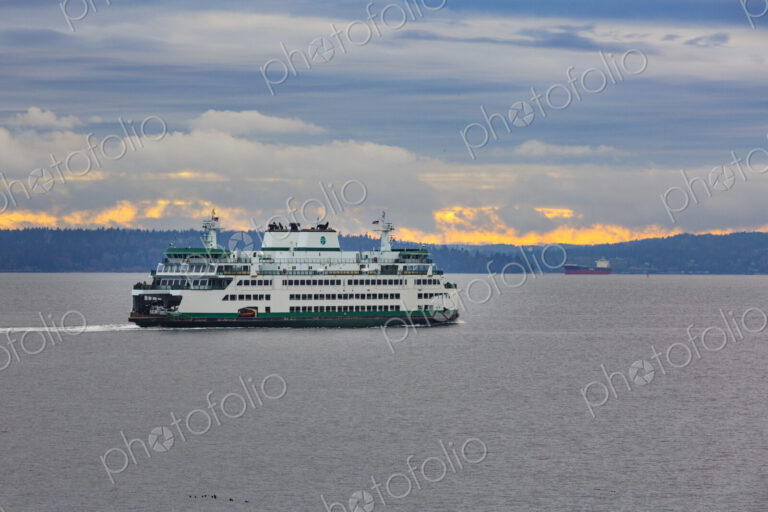 Bainbridge Island to Seattle ferry on Elliott Bay with Mount Rainier in the distant…