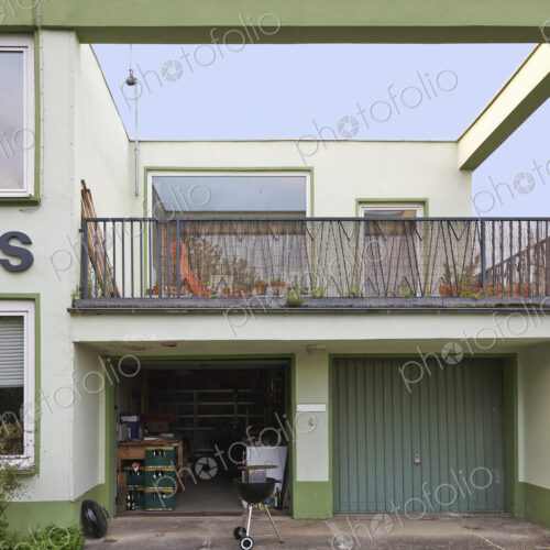 Balcony and open garage of retro home Balcony and open garage of retro home