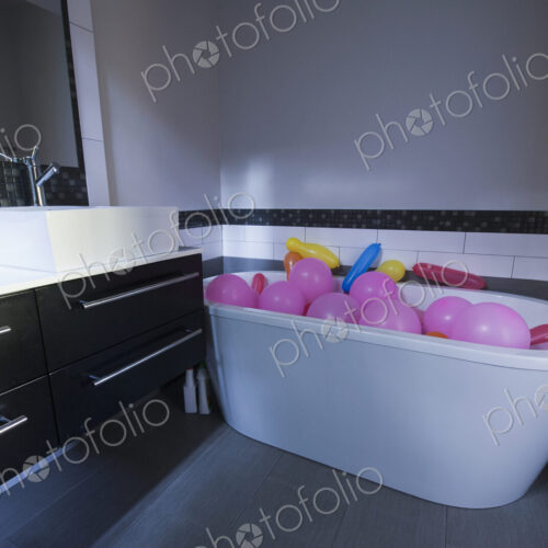 Balloons in a Bathtub in a modern bathroom Balloons in a Bathtub in a modern bathroom