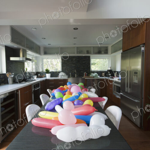 Balloons on a Dining Room Table Balloons on a Dining Room Table