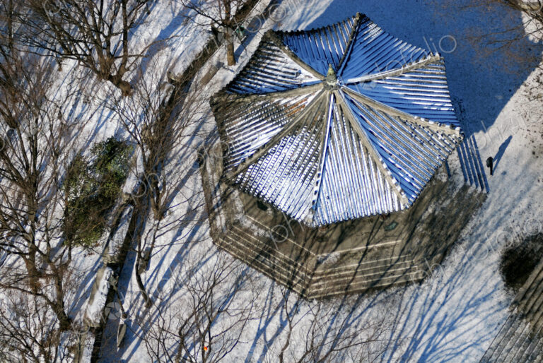 Bandstand in snowy park, from above.