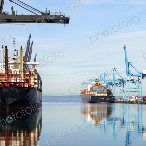 Barges with containers in industrial shipyard Barges with containers in industrial shipyard