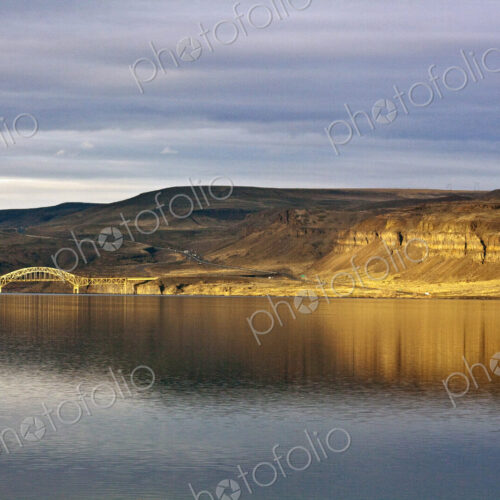 Barren Cliff Face Reflected in Water