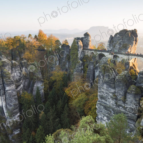 Bastei rock formation above the Elbe River with bridge linking several rocks. Bastei rock formation above the Elbe River with bridge linking several rocks.