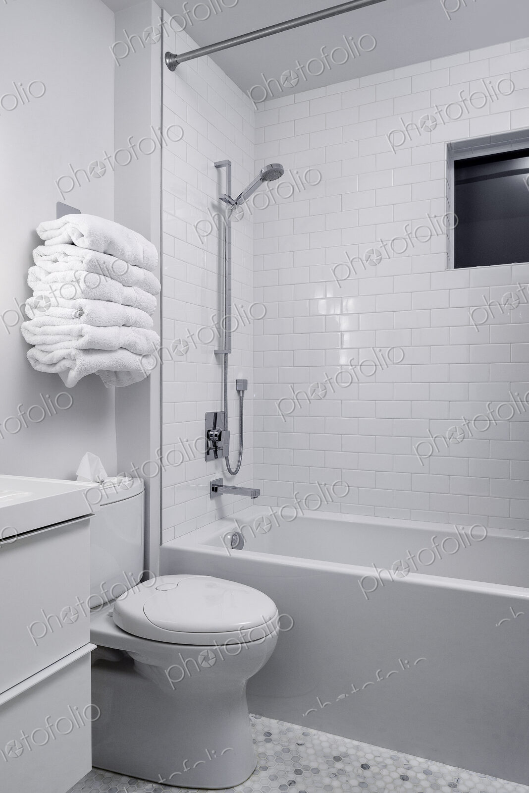 Bathtub, toilet and shower in modern bathroom