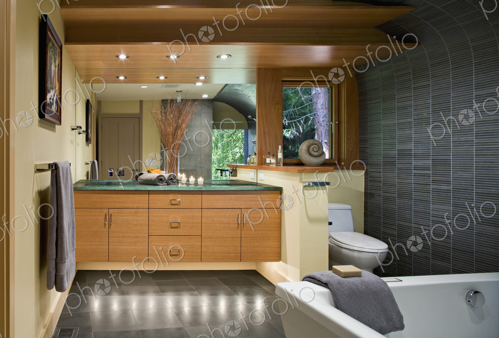 Bathtub, toilet and sink in modern bathroom