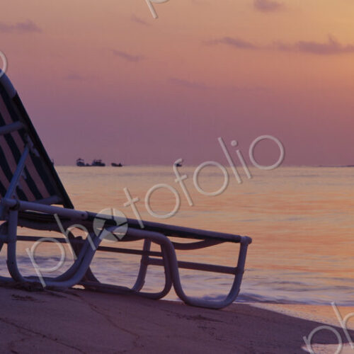Beach Lounger at Sunrise