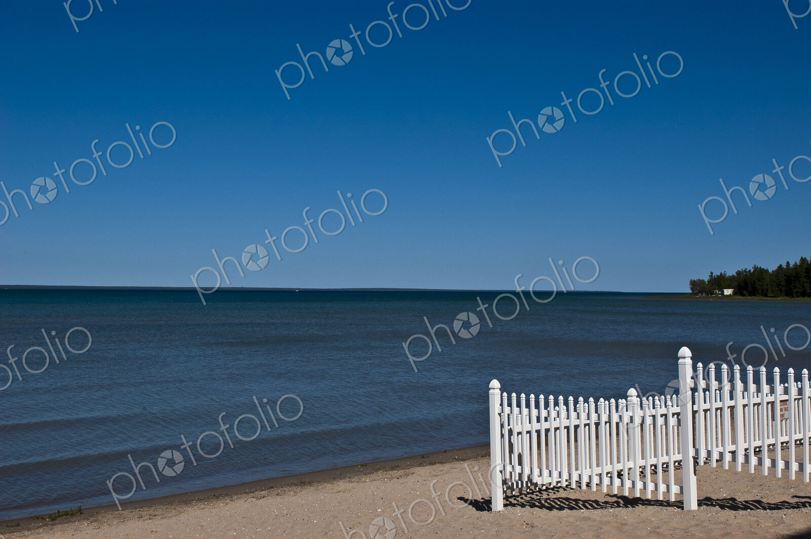 Beach Scene with a Fense
