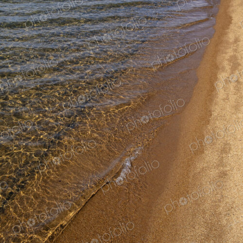 Beach and clear, clean waters of Lake Tahoe, High Sierra, CA, USA Beach and clear, clean waters of Lake Tahoe, High Sierra, CA, USA