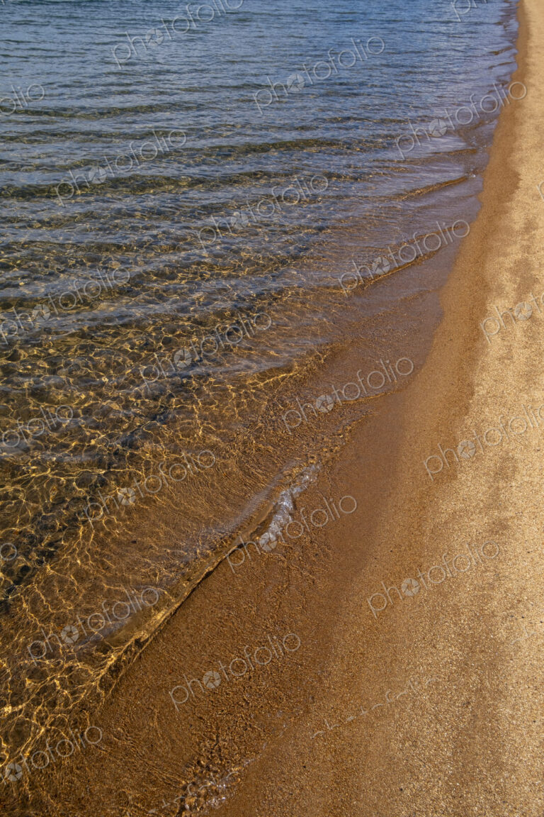 Beach and clear, clean waters of Lake Tahoe, High Sierra, CA, USA