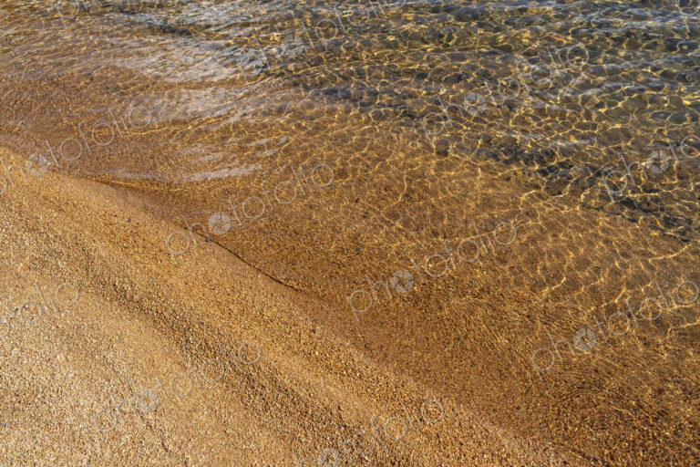 Beach and clear, clean waters of Lake Tahoe, High Sierra, CA, USA