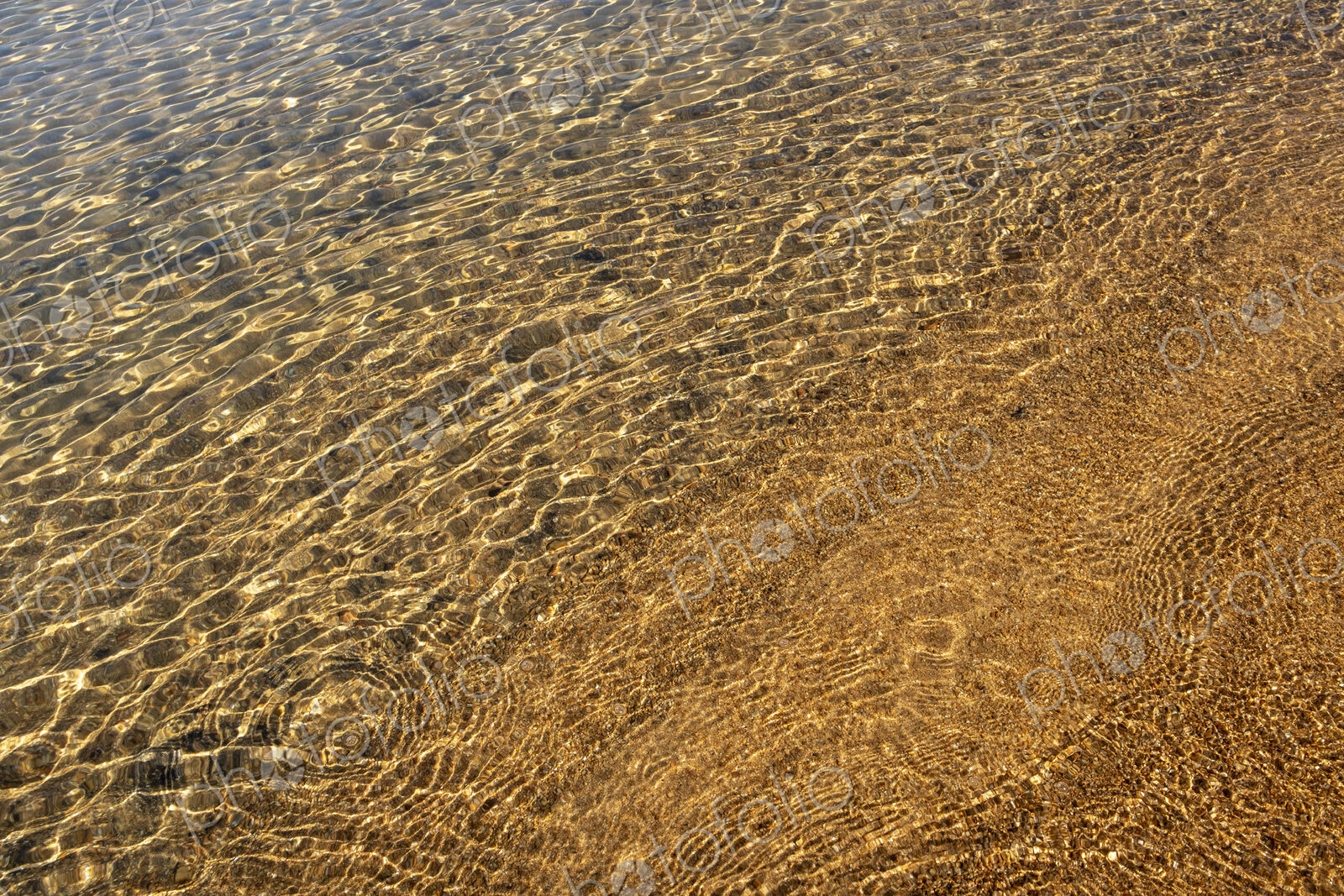 Beach and clear, clean waters of Lake Tahoe, High Sierra, CA, USA