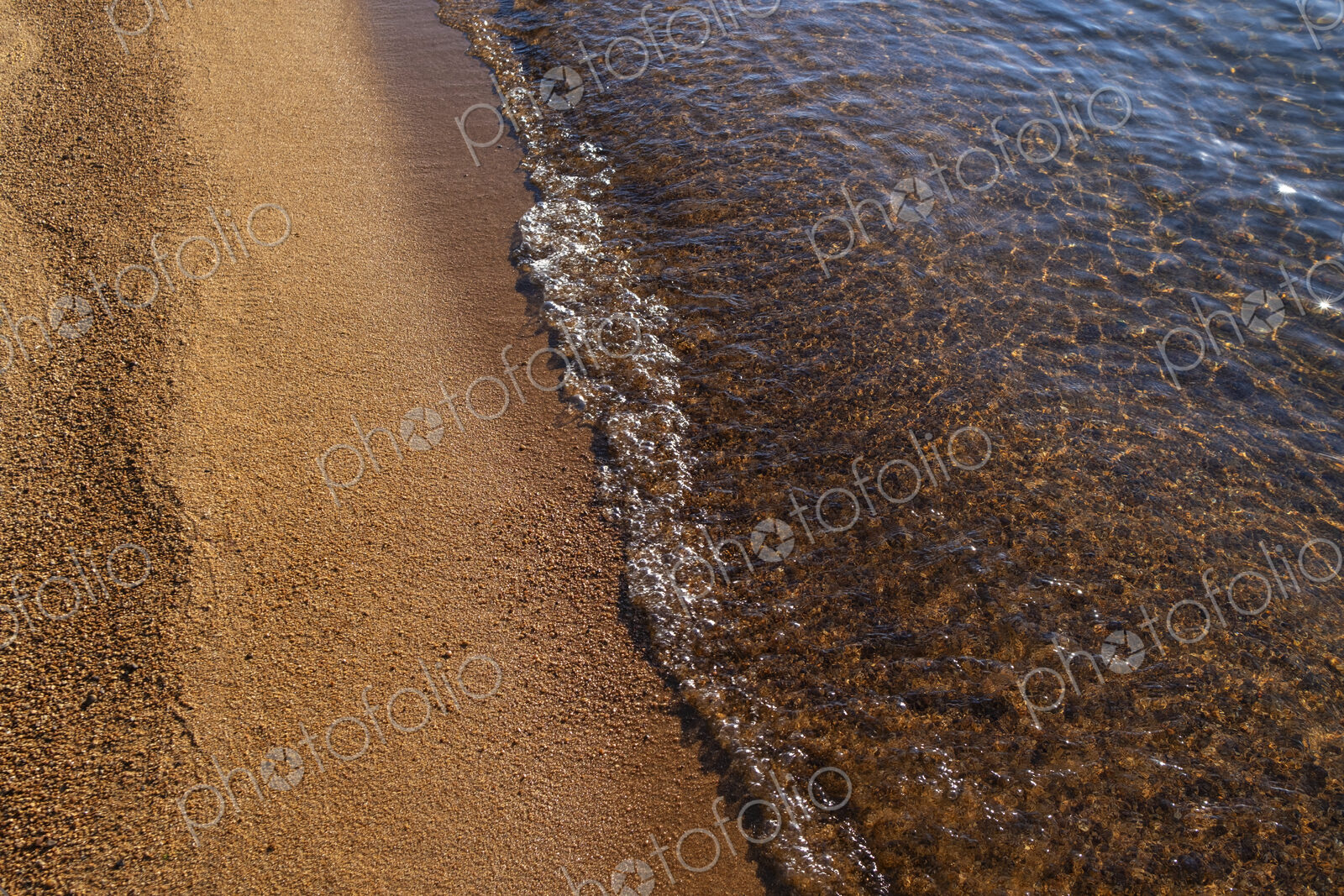 Beach and clear, clean waters of Lake Tahoe, High Sierra, CA, USA