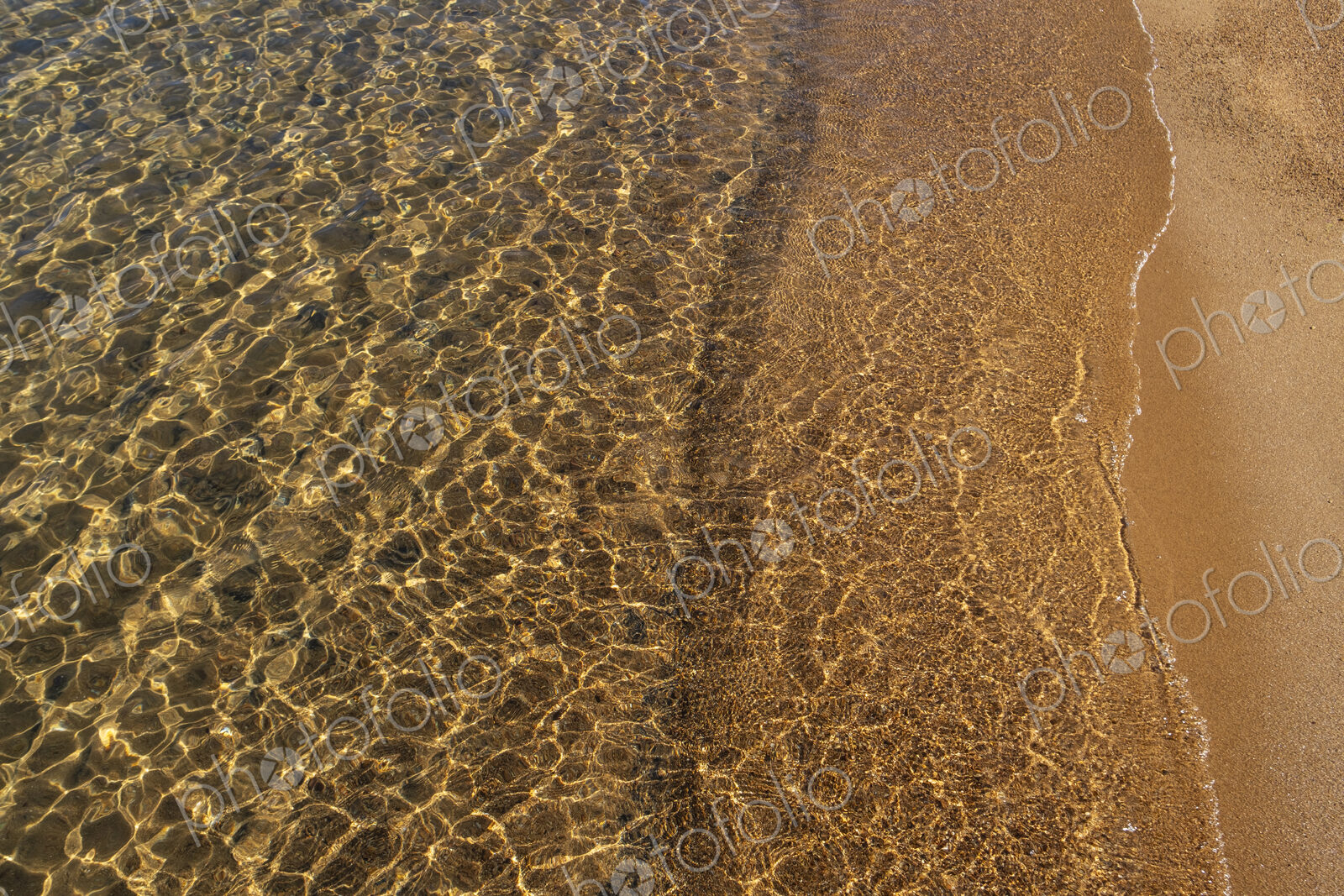 Beach and clear, clean waters of Lake Tahoe, High Sierra, CA, USA