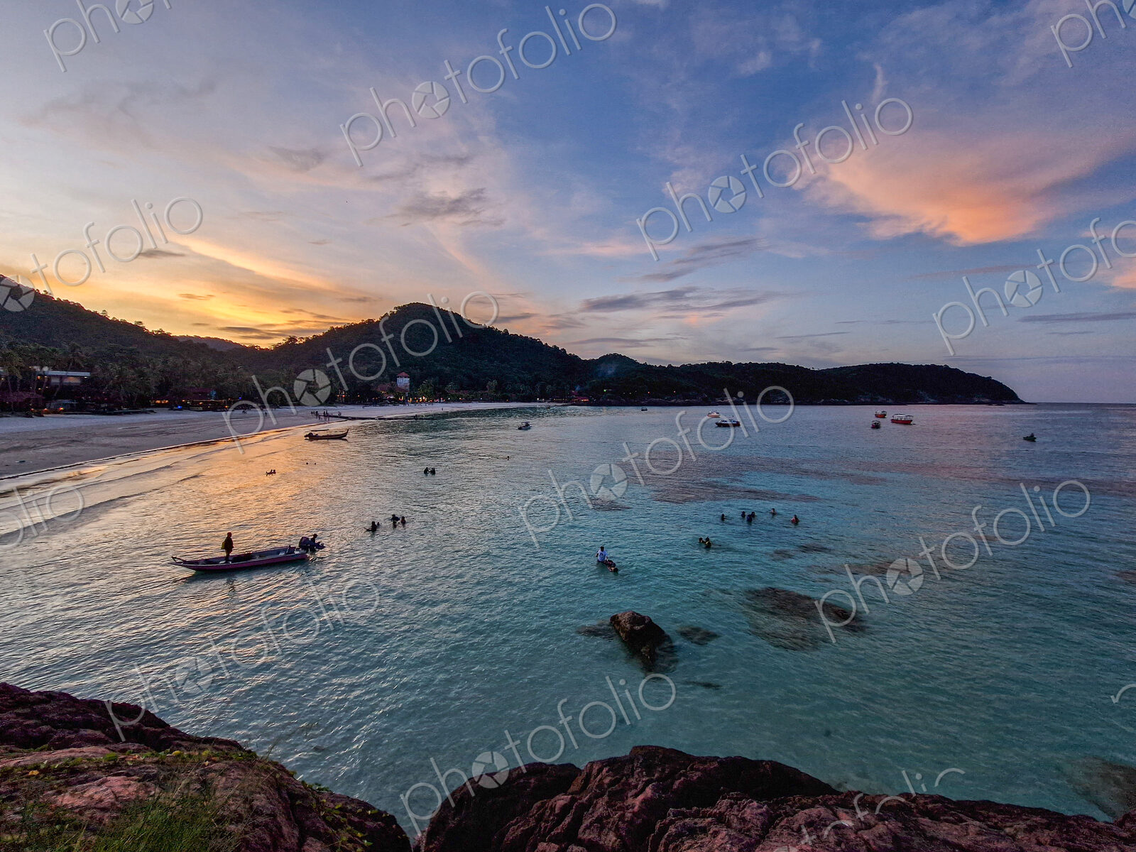 Beach at Palau Redang at sunset.