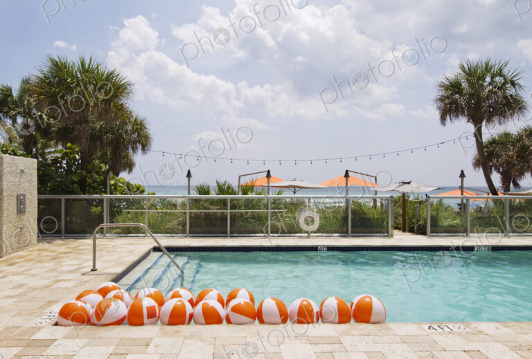 Beach balls in swimming pool