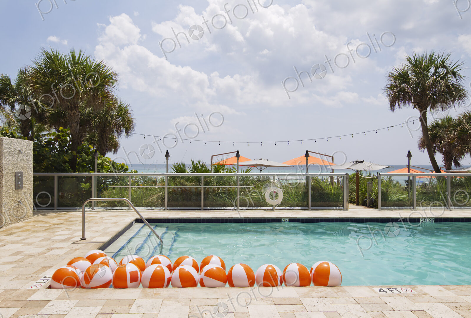 Beach balls in swimming pool