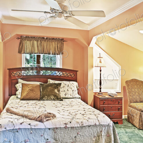 Bed and night stands in rustic bedroom