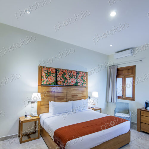 Bed and night table in modern bedroom Bed and night table in modern bedroom
