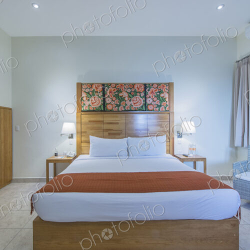 Bed and night table in modern bedroom Bed and night table in modern bedroom