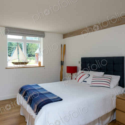 Bed and night table in modern bedroom