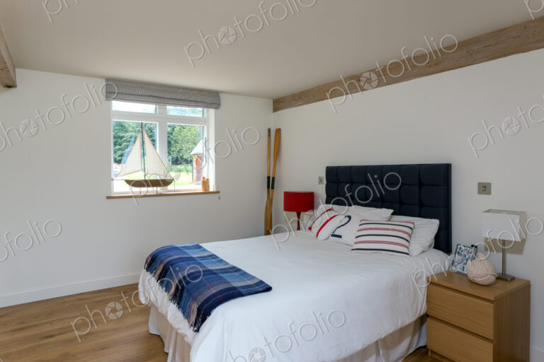 Bed and night table in modern bedroom