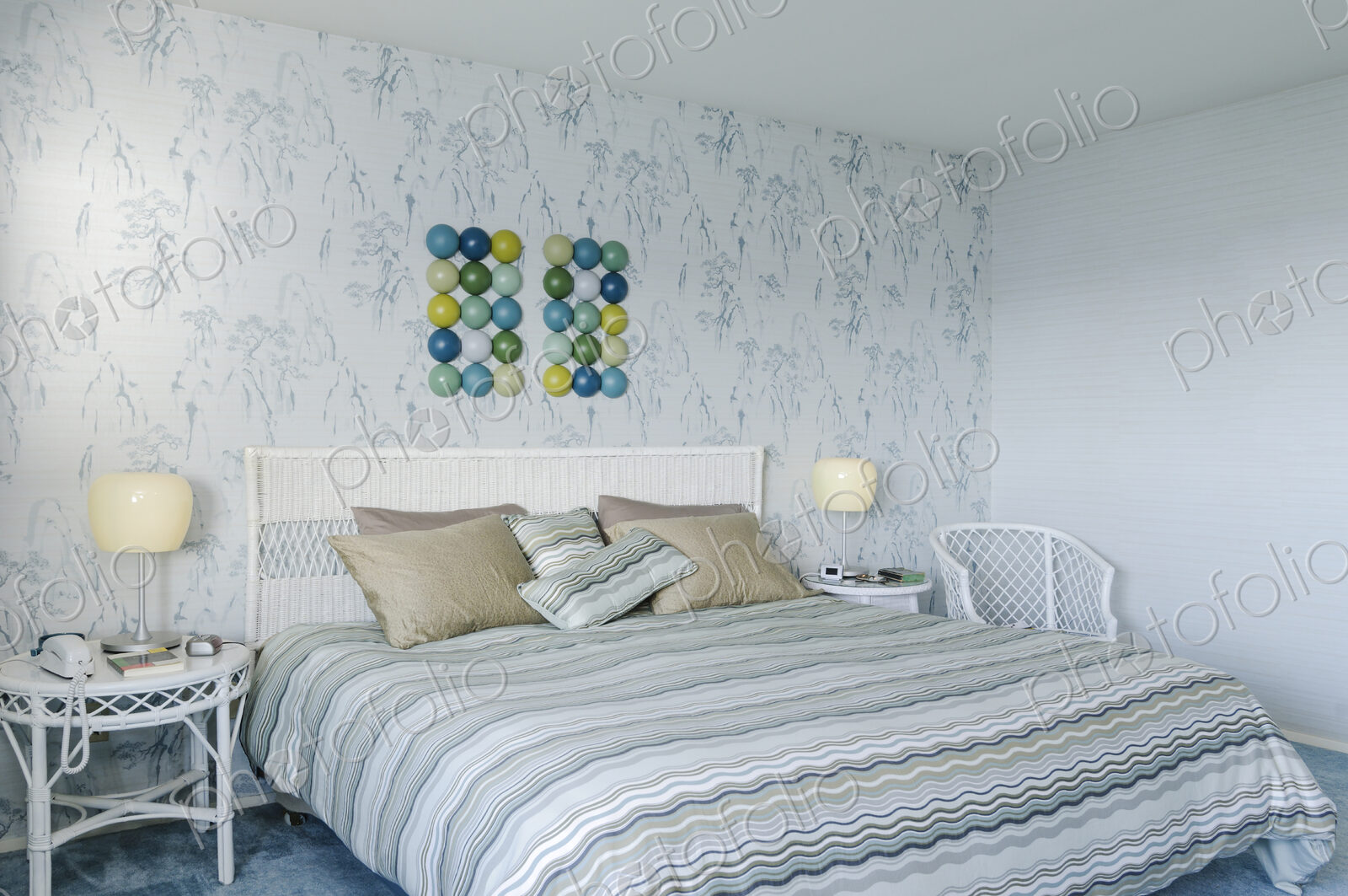 Bed and wall art in modern bedroom