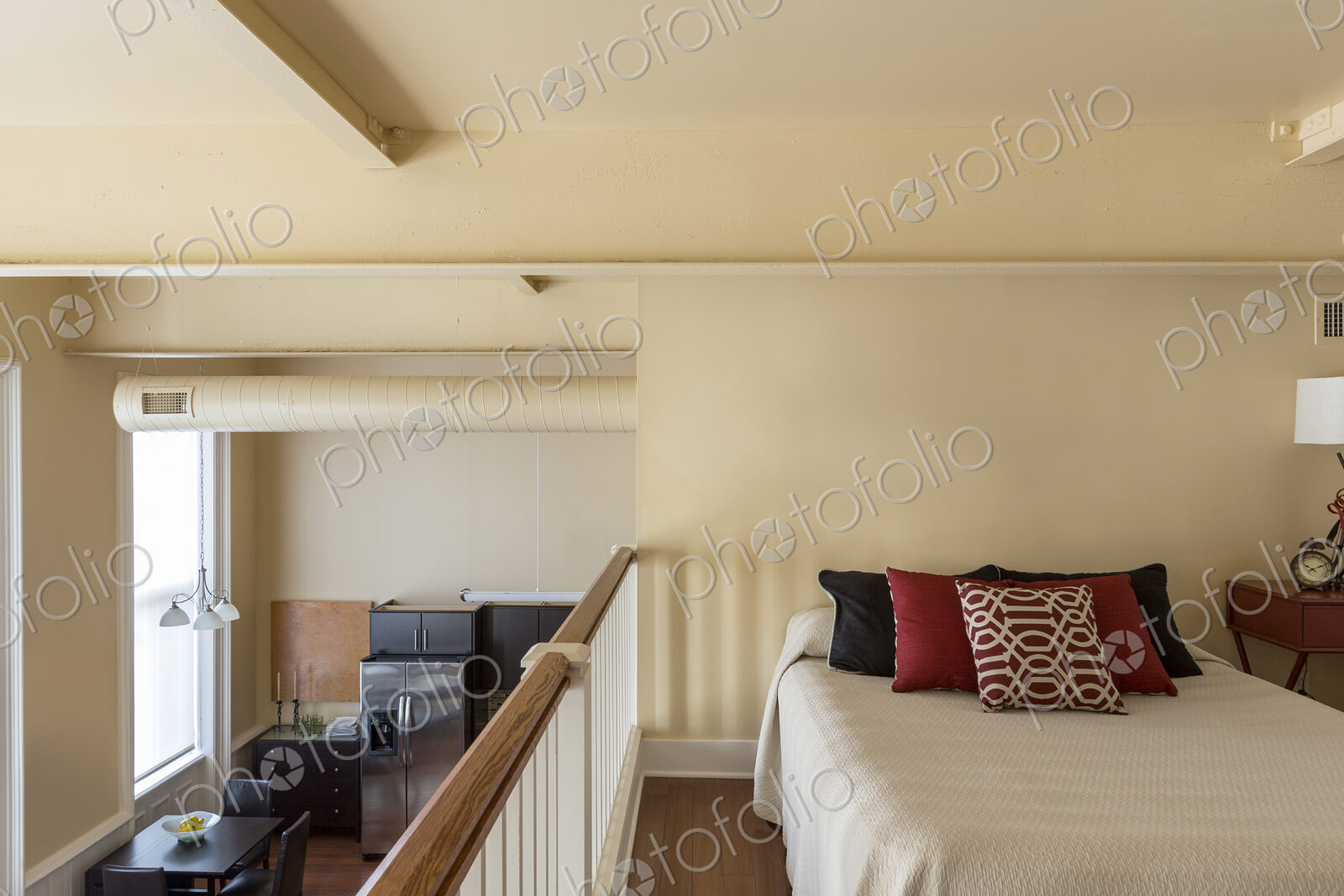 Bed in loft of modern home