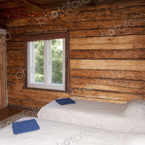 Beds in a Wooden Bedroom Beds in a Wooden Bedroom