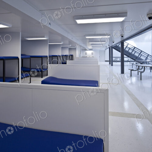 Beds in minimum security jail corridor