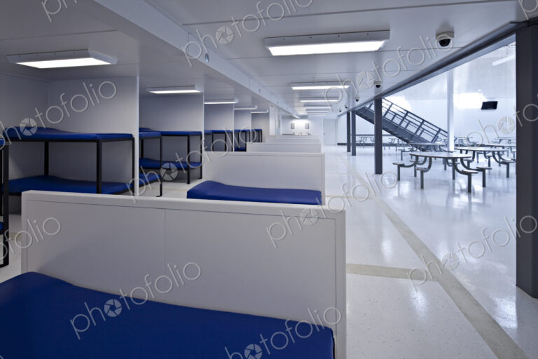Beds in minimum security jail corridor