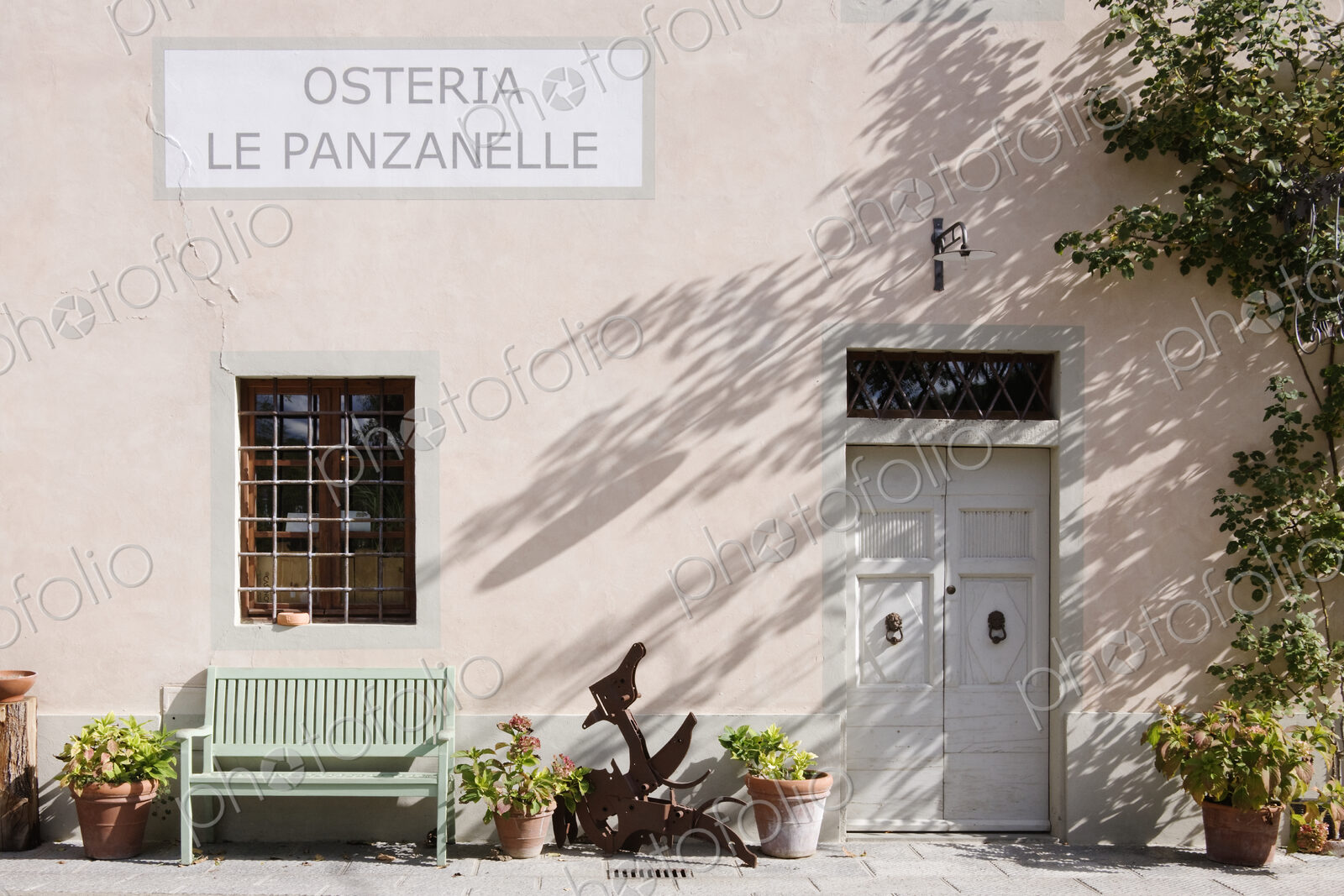 Bench Outside Osteria Le Panzanelle Restaurant and Inn