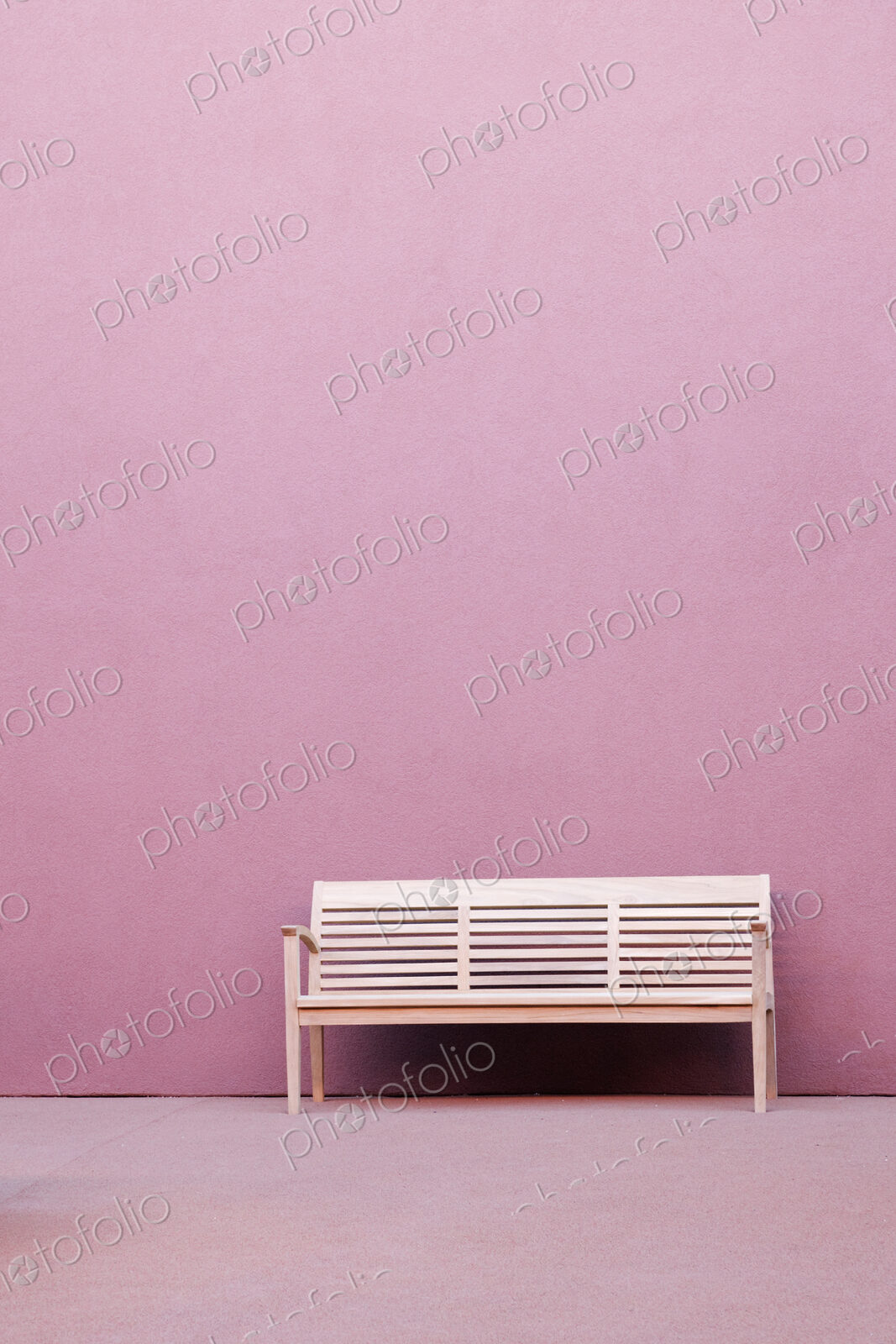Bench in Front of Pink Wall