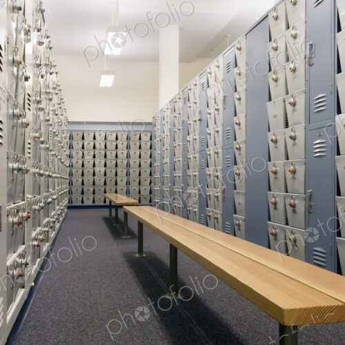 Benches and lockers in locker room Benches and lockers in locker room