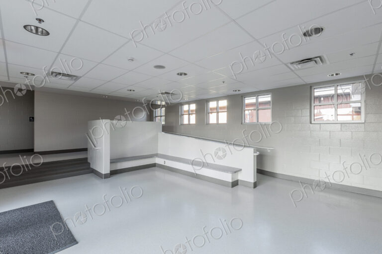 Benches, ramp and stairs in lobby of animal shelter