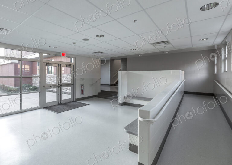 Benches, ramp and stairs in lobby of animal shelter