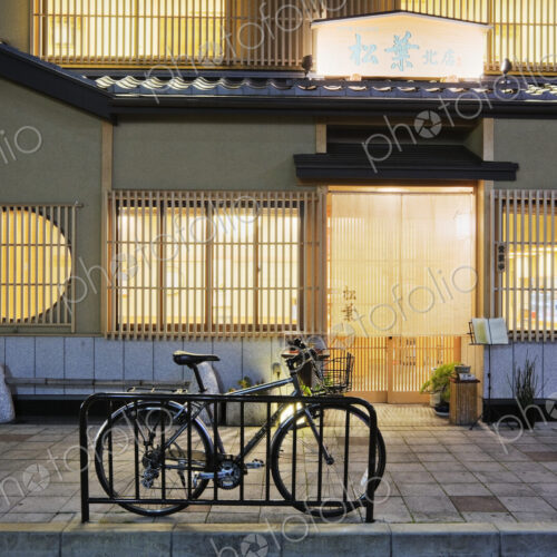 Bicycle Outside an Asian Restaurant Bicycle Outside an Asian Restaurant