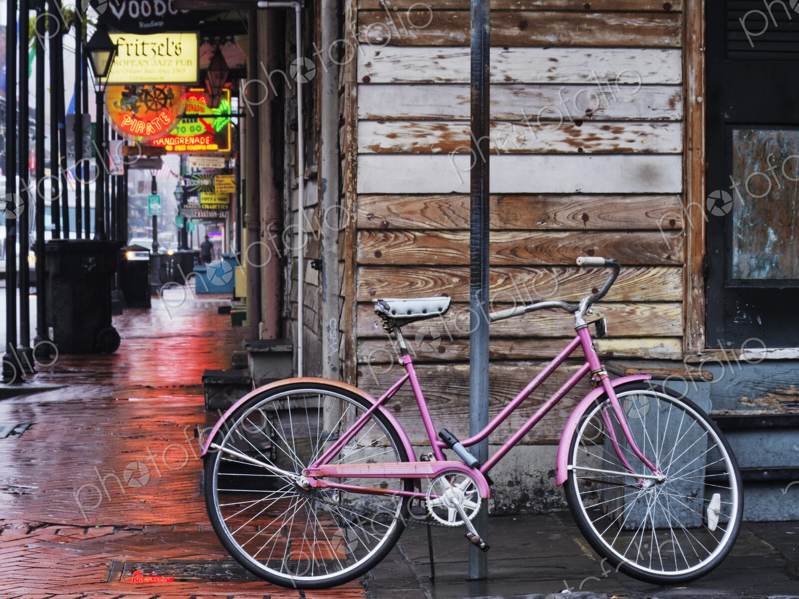 Bicycle Secured to a Sign Post