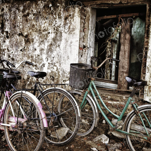Bicycles Parked Along an Old Wall Bicycles Parked Along an Old Wall
