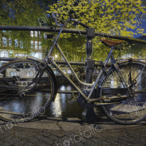 Bicycles Secured to Canal Railing