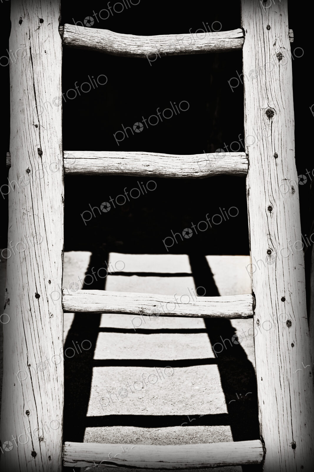 Black and White Wooden Ladder