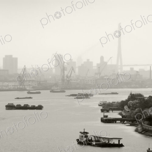 Black and White of Cranes and River Traffic Black and White of Cranes and River Traffic