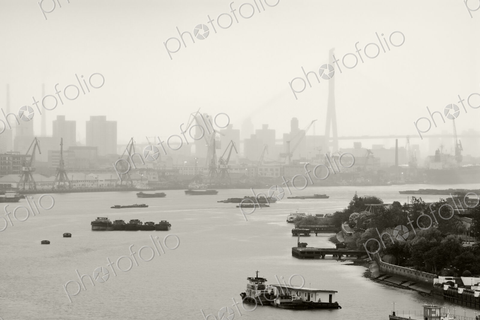 Black and White of Cranes and River Traffic