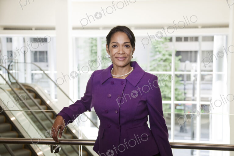 Black businesswoman in lobby of large business center