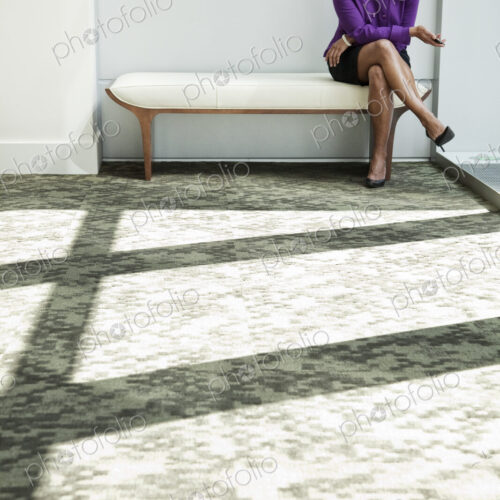 Black businesswoman in lobby of large business center Black businesswoman in lobby of large business center
